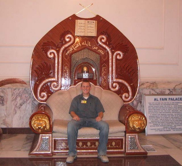 Mark Stickel sits on Saddam Hussein's "throne" at the Al Faw Palace in Baghdad, Iraq.  The palace, once Saddam's favorite getaway, is now the headquarters for coalition operations in Iraq.