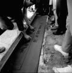 Revelle's first class carves their names into the bricks on Revelle Plaza
